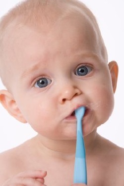 Child with toothbrush